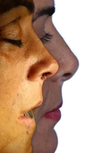 A side view of two faces in profile with closed eyes and neutral expressions against a black background.